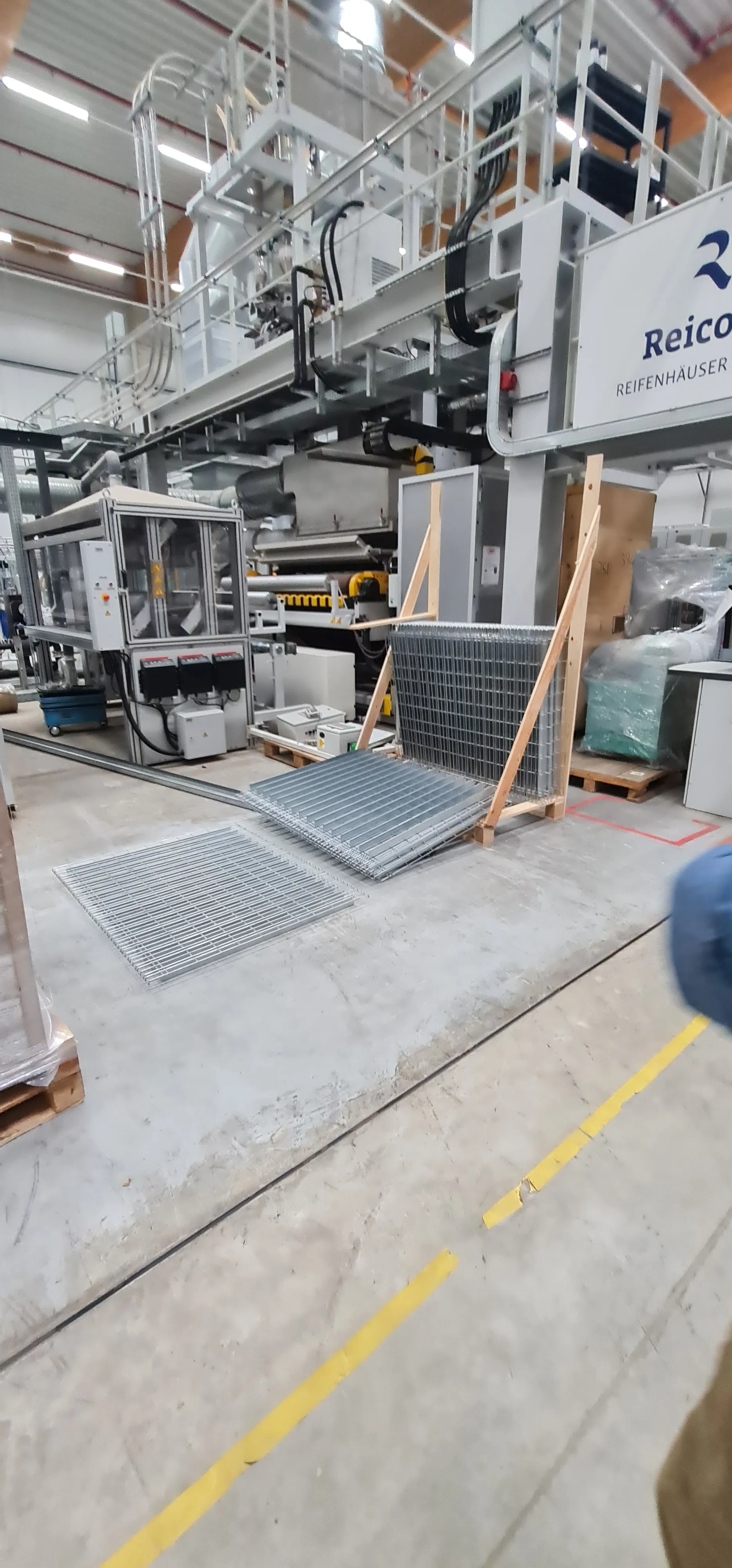Mesh guard panels and floor gratings near the line