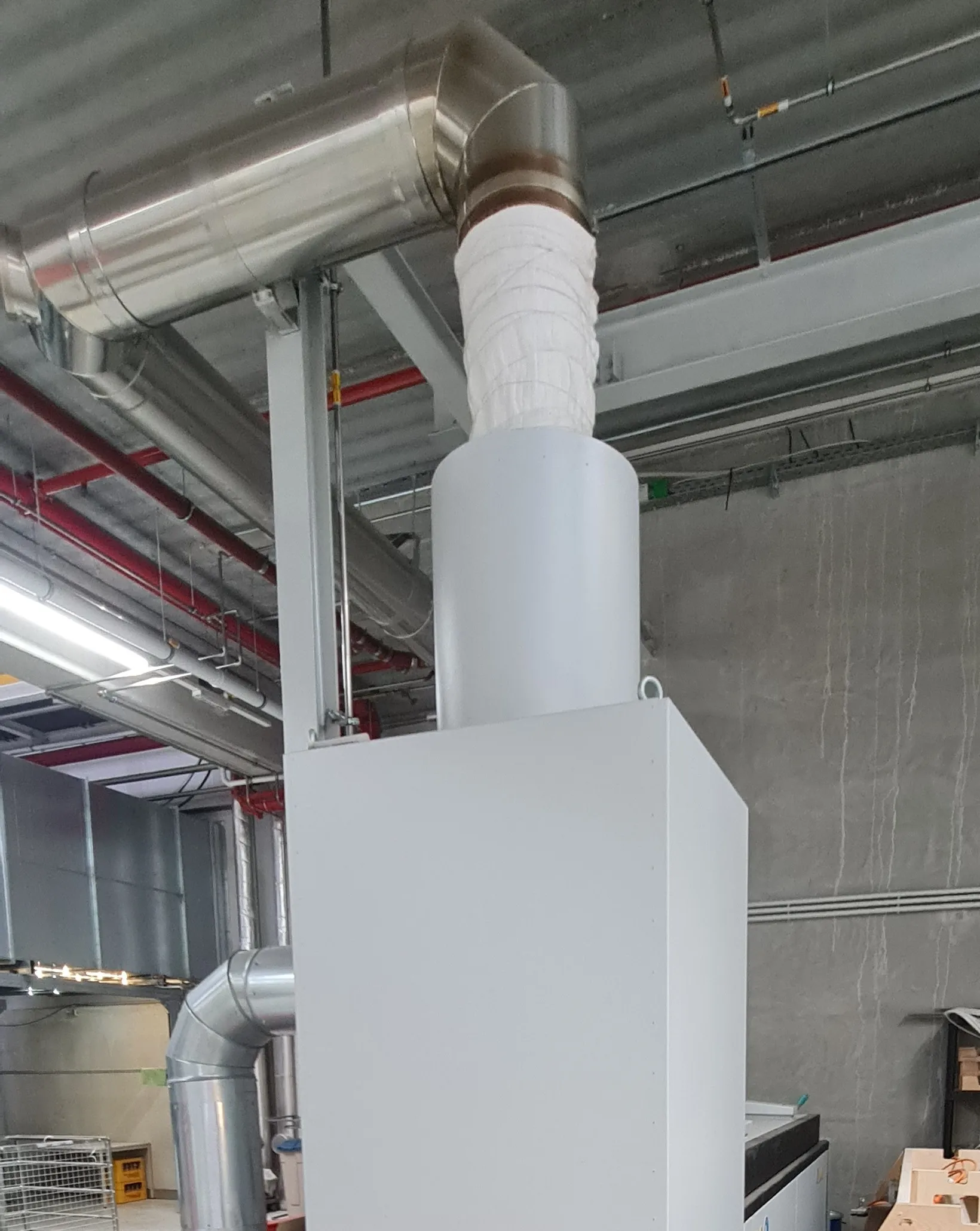 Burn-off oven exhaust: insulated duct to the ceiling