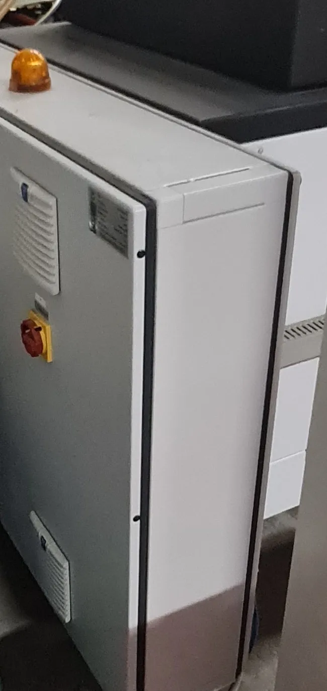Control cabinet with beacon and main switch